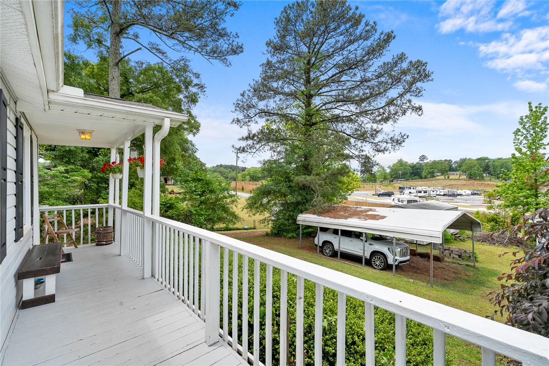 111 State Rd S-4-104 Anderson, SC 29626 - Photo 41 of 42 This inviting porch offers seasonal views, perfect for enjoying peaceful moments outdoors.