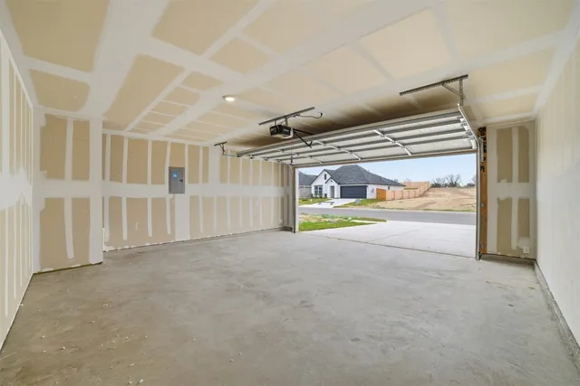 a bathroom with a double vanity sink and mirror