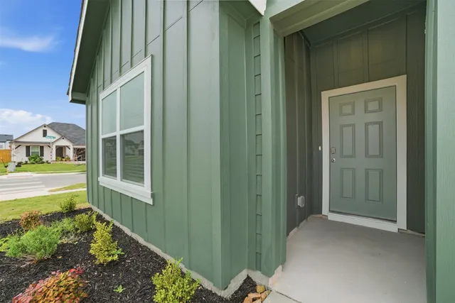 a view of front door and porch