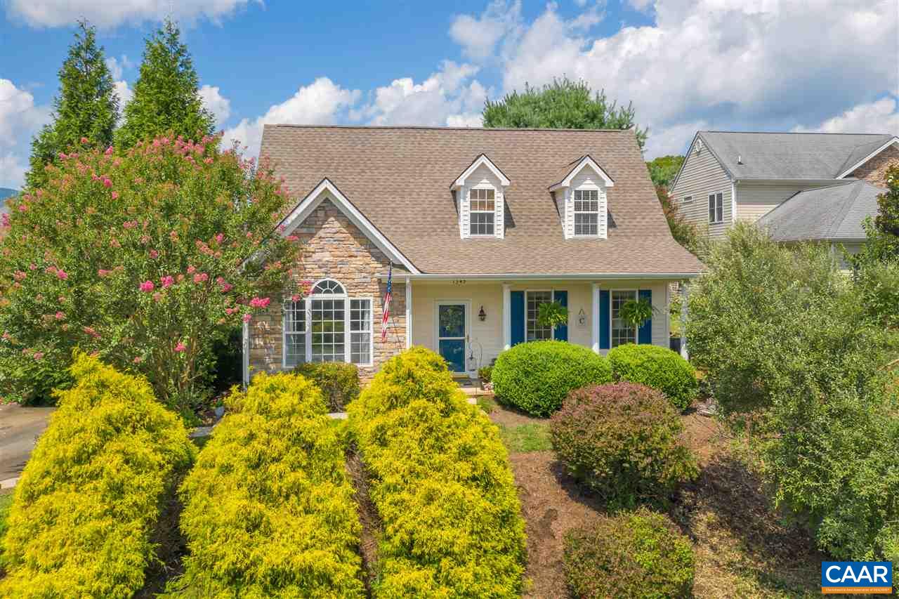 1345 Amber Ridge Road Charlottesville, VA 22901 - Photo 1 of 34 a front view of a house with a yard