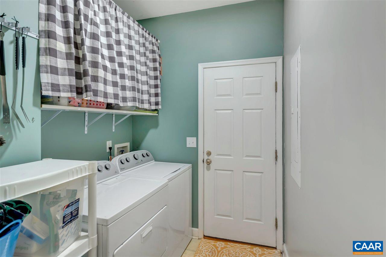1345 Amber Ridge Road Charlottesville, VA 22901 - Photo 18 of 34 a utility room with a washing machine and a sink