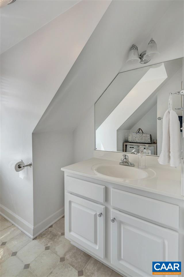 1345 Amber Ridge Road Charlottesville, VA 22901 - Photo 26 of 34 a bathroom with a sink and a mirror