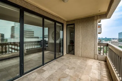 a view of a hallway with a balcony