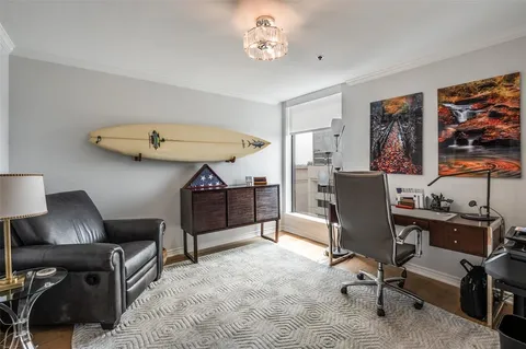 a view of a workspace with furniture