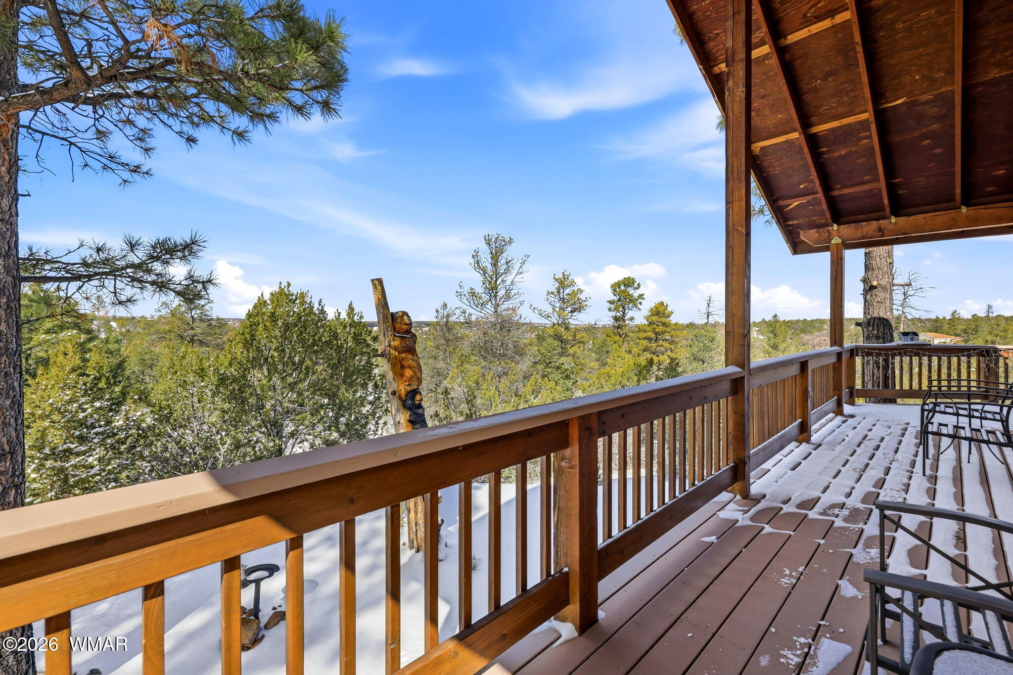 3650 Pine Rim Drive Overgaard, AZ 85933 - Photo 16 of 36 a view of a balcony with wooden floor