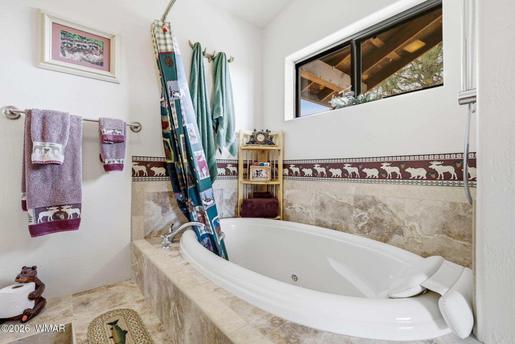 3650 Pine Rim Drive Overgaard, AZ 85933 - Photo 19 of 36 a bathroom with a tub sink and a mirror
