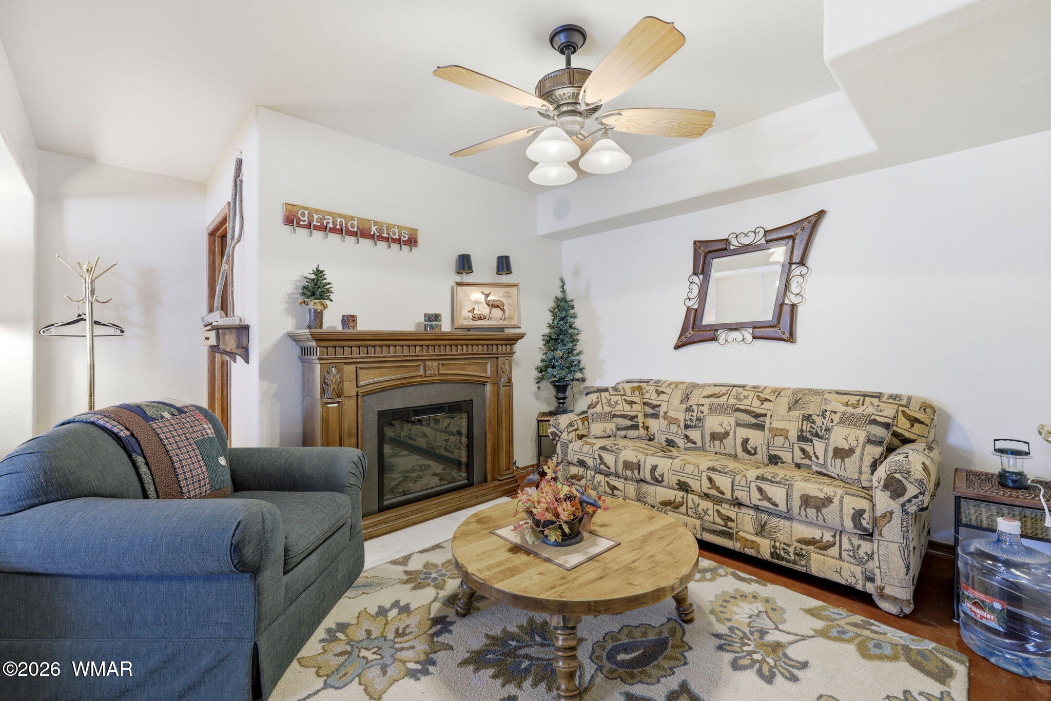 3650 Pine Rim Drive Overgaard, AZ 85933 - Photo 27 of 36 a living room with furniture and a fireplace