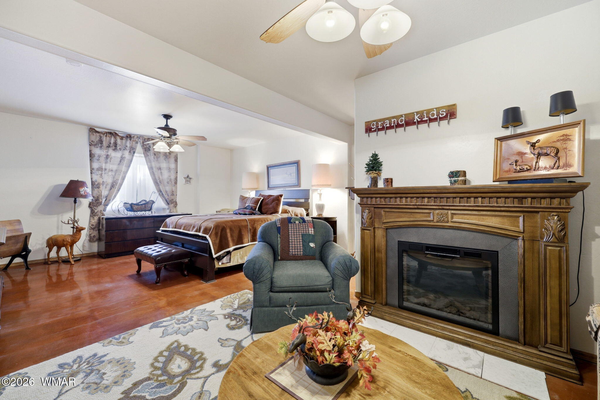 3650 Pine Rim Drive Overgaard, AZ 85933 - Photo 28 of 36 a living room with furniture and a fireplace