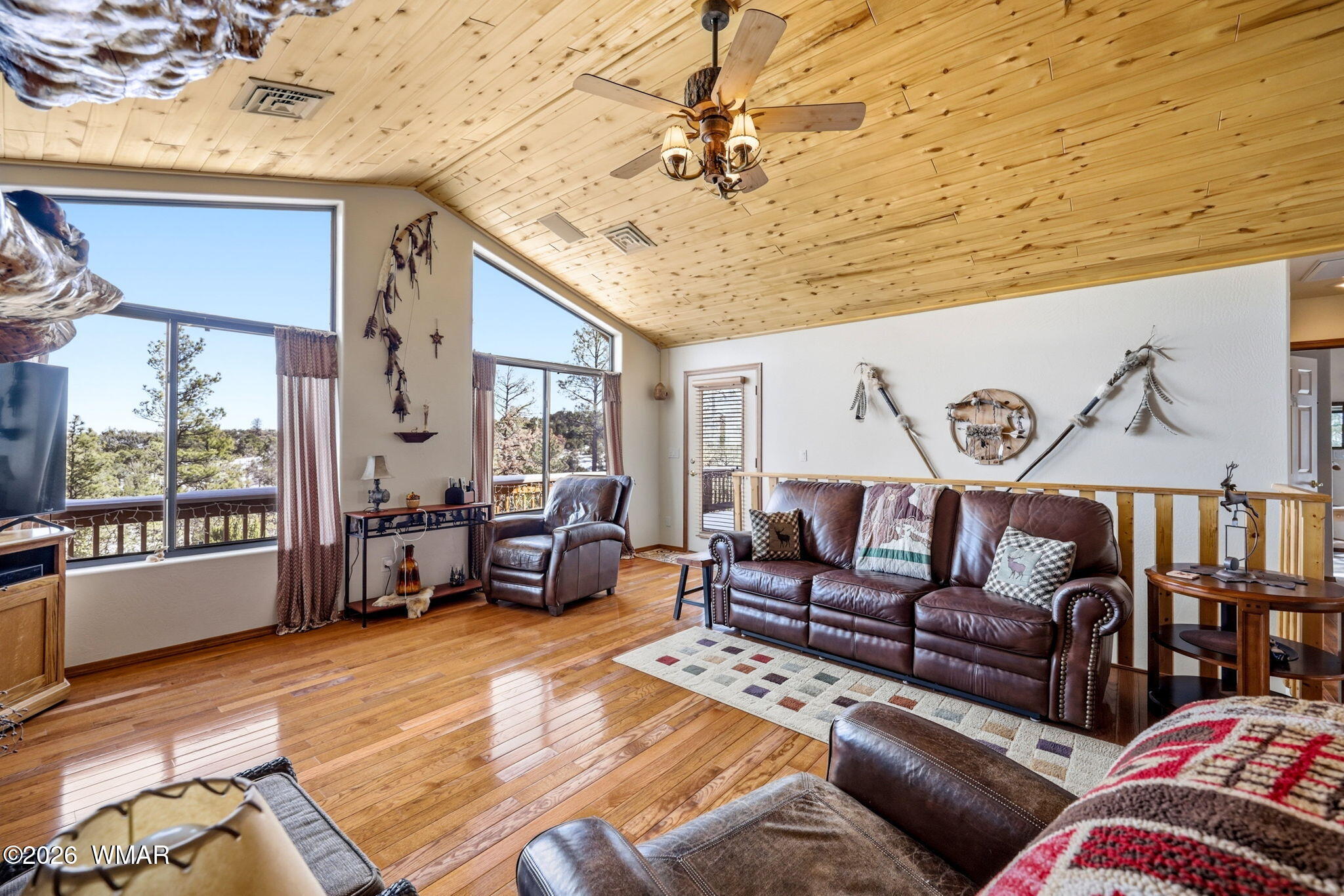 3650 Pine Rim Drive Overgaard, AZ 85933 - Photo 7 of 36 a living room with furniture and a large window