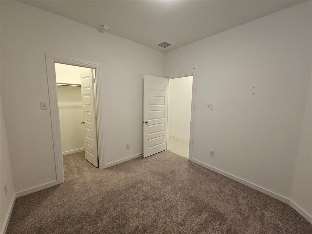 3915 Chesapeake Lane Crandall, TX 75114 - Photo 13 of 32 an empty room with closet