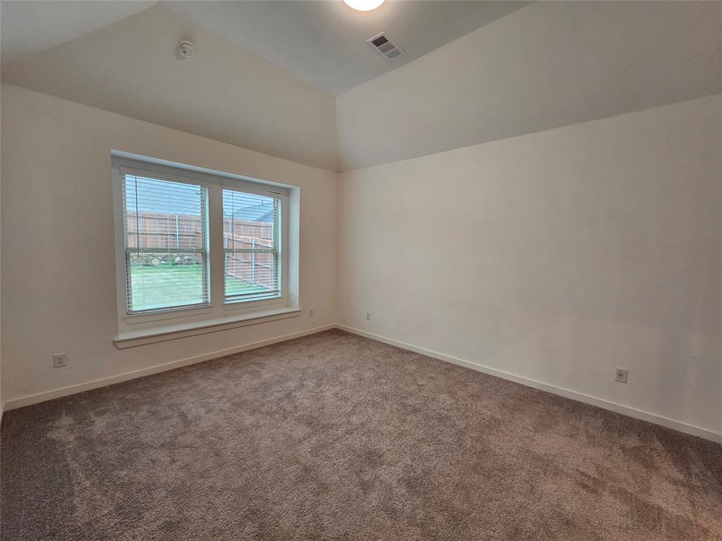 3915 Chesapeake Lane Crandall, TX 75114 - Photo 20 of 32 an empty room with windows