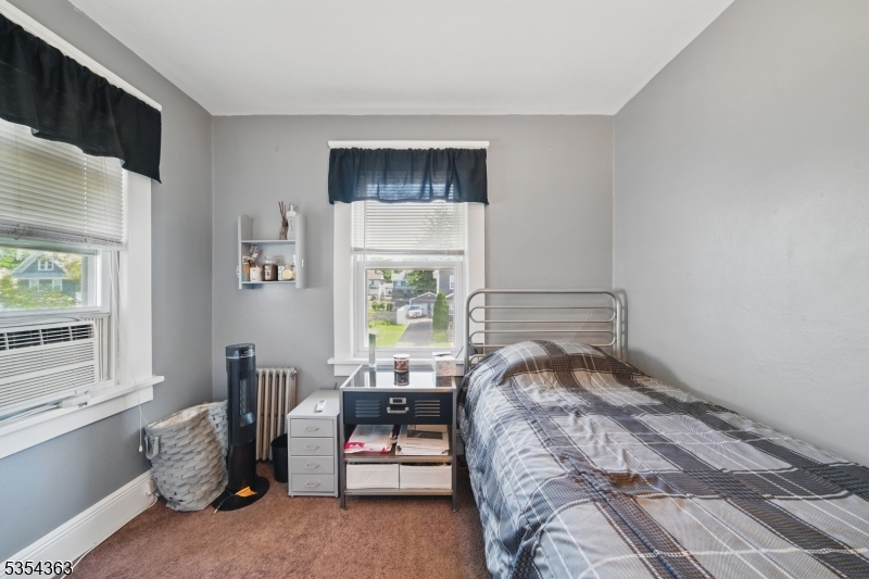 149 Roessler Street Boonton, NJ 07005 - Photo 14 of 30 a bedroom with a bed and a window