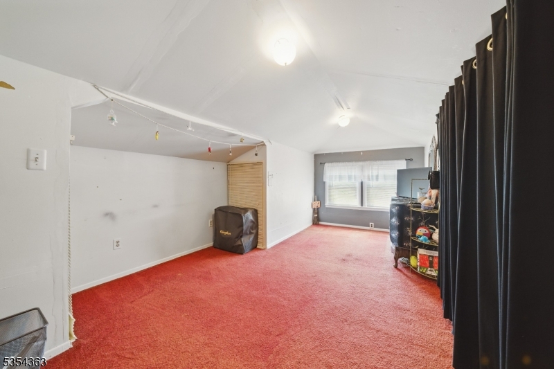 149 Roessler Street Boonton, NJ 07005 - Photo 16 of 30 a view of empty room with wooden floor and fan