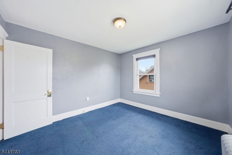 149 Roessler Street Boonton, NJ 07005 - Photo 21 of 42 a view of an empty room with a window