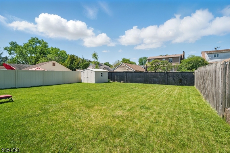 149 Roessler Street Boonton, NJ 07005 - Photo 23 of 30 a front view of a house with a yard