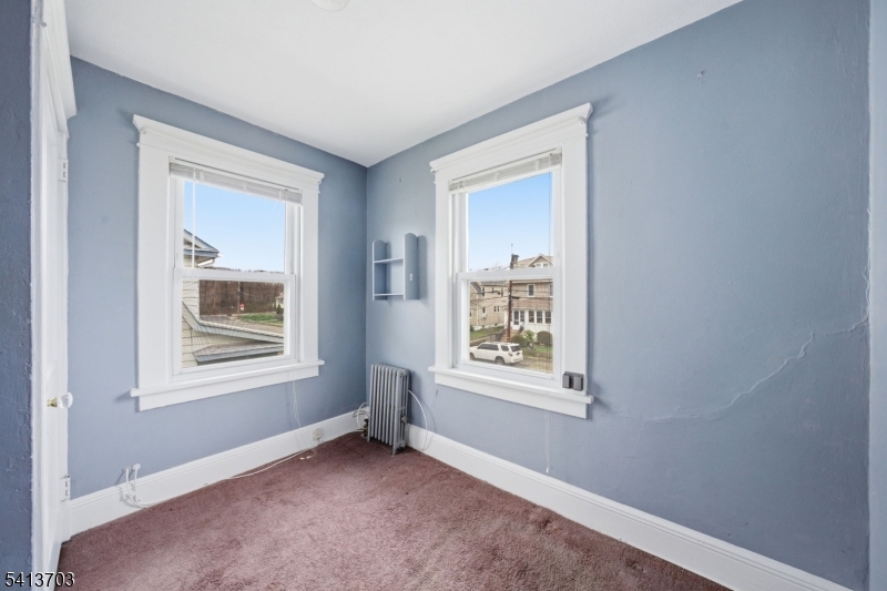 149 Roessler Street Boonton, NJ 07005 - Photo 25 of 42 a view of an empty room with a window