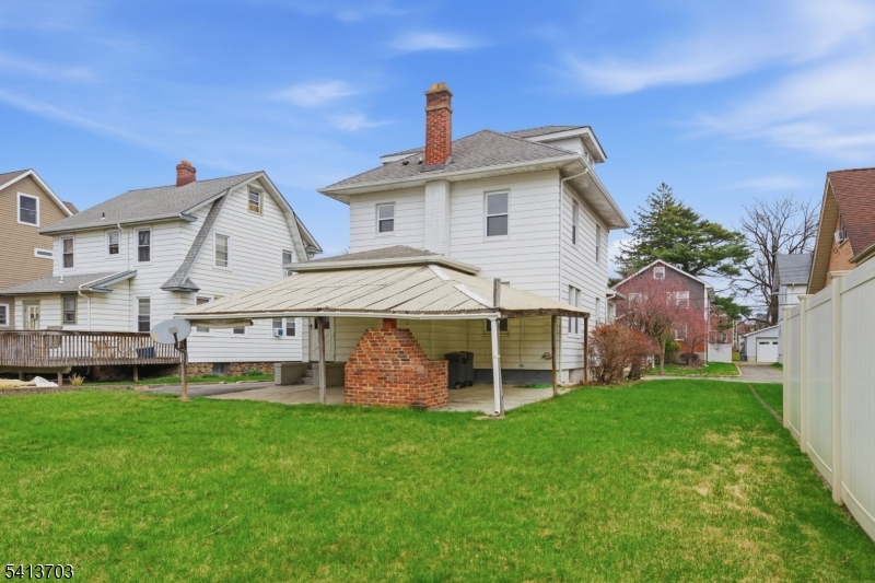 149 Roessler Street Boonton, NJ 07005 - Photo 30 of 42 a front view of a house with a yard