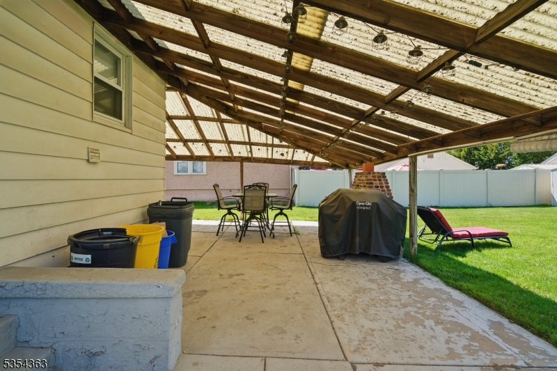 149 Roessler Street Boonton, NJ 07005 - Photo 33 of 42 a view of a patio with table and chairs