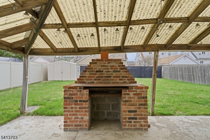 149 Roessler Street Boonton, NJ 07005 - Photo 34 of 42 a front view of a house with a garden