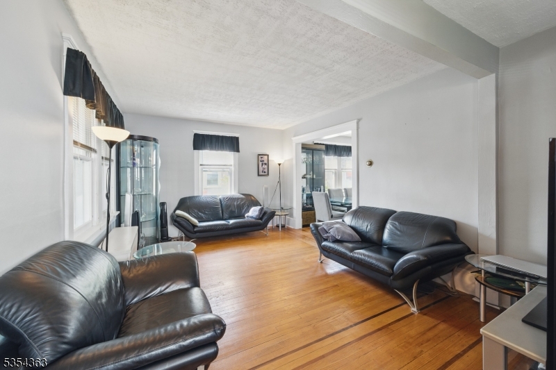 149 Roessler Street Boonton, NJ 07005 - Photo 5 of 30 a living room with furniture and a couch
