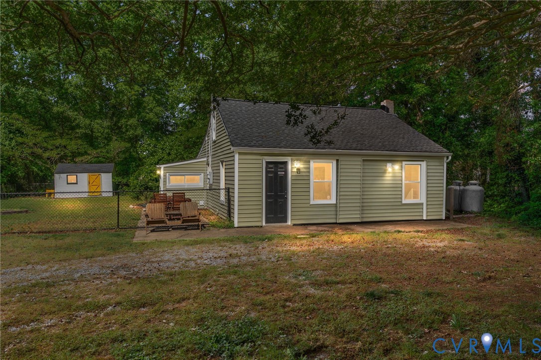 200 Brooks Road Richmond, VA 23223 - Photo 1 of 58 a front view of a house with a garden