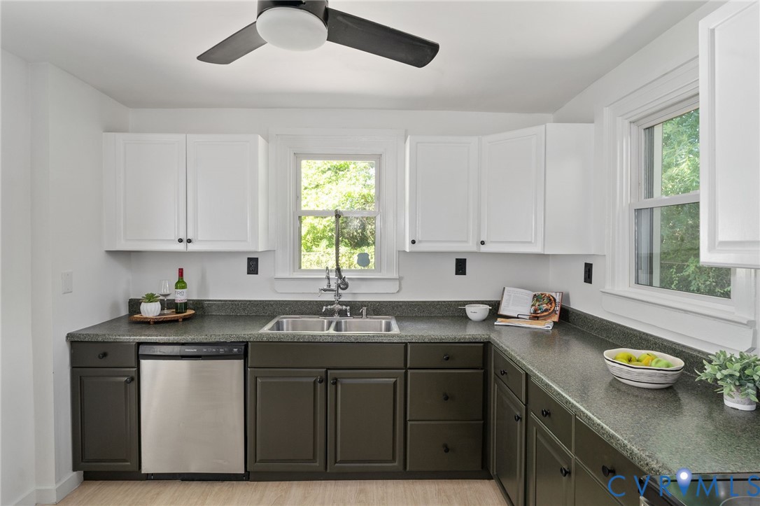200 Brooks Road Richmond, VA 23223 - Photo 17 of 58 a kitchen with a sink stove and cabinets