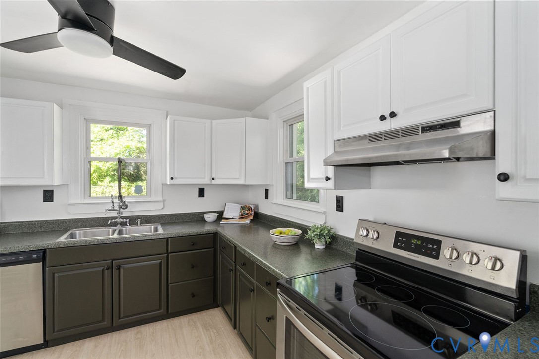 200 Brooks Road Richmond, VA 23223 - Photo 18 of 58 a kitchen with a sink appliances and cabinets