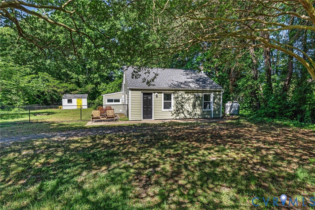 200 Brooks Road Richmond, VA 23223 - Photo 2 of 58 a front view of a house with a garden