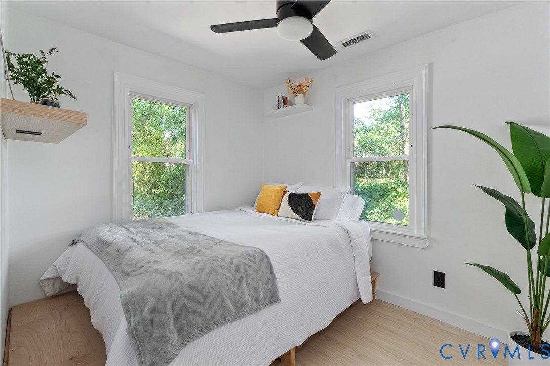 200 Brooks Road Richmond, VA 23223 - Photo 31 of 58 a bedroom with a large bed and a window