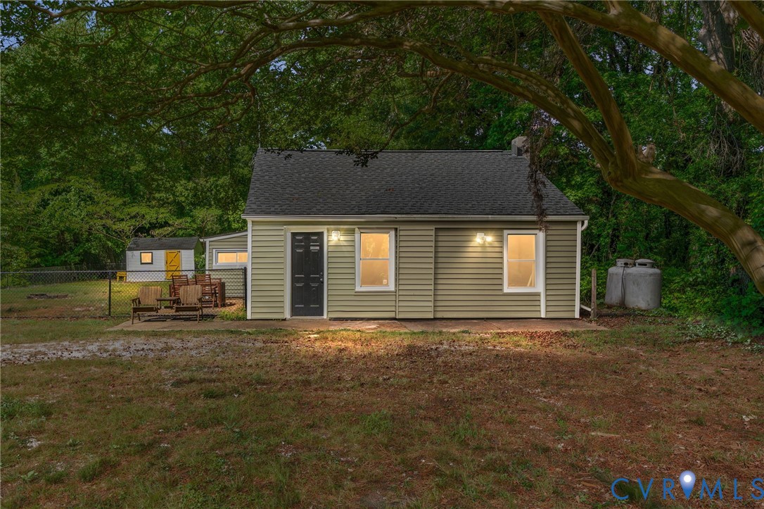 200 Brooks Road Richmond, VA 23223 - Photo 56 of 58 a front view of a house with a garden