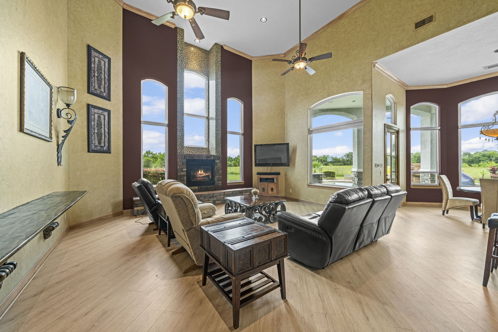 18732 Kz Road Cypress, TX 77433 - Photo 8 of 49 Your living room becomes a private viewing deck, offering panoramic views of your stunning estate all year round.