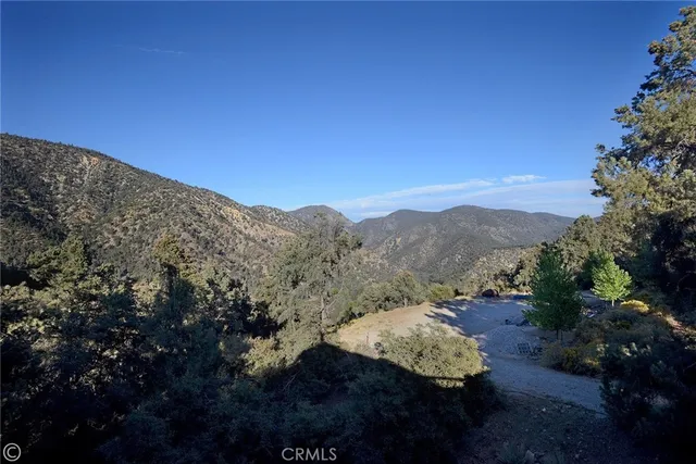 a view of balcony with wooden floor
