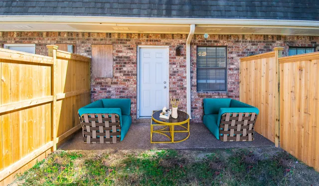 a outdoor view of a building with outdoor seating