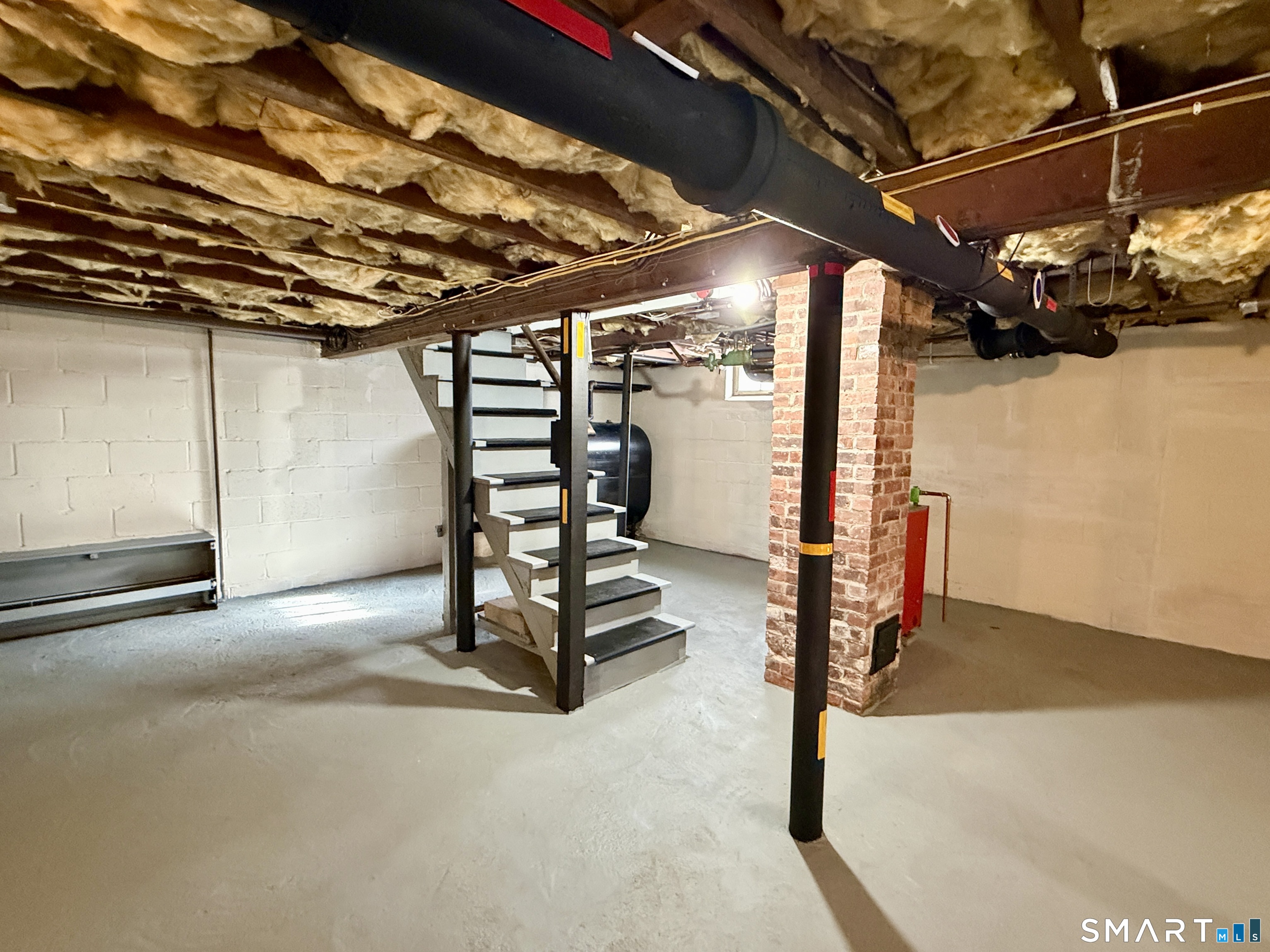 148 Lois Street Torrington, CT 06790 - Photo 14 of 17 a view of a room with gym equipment