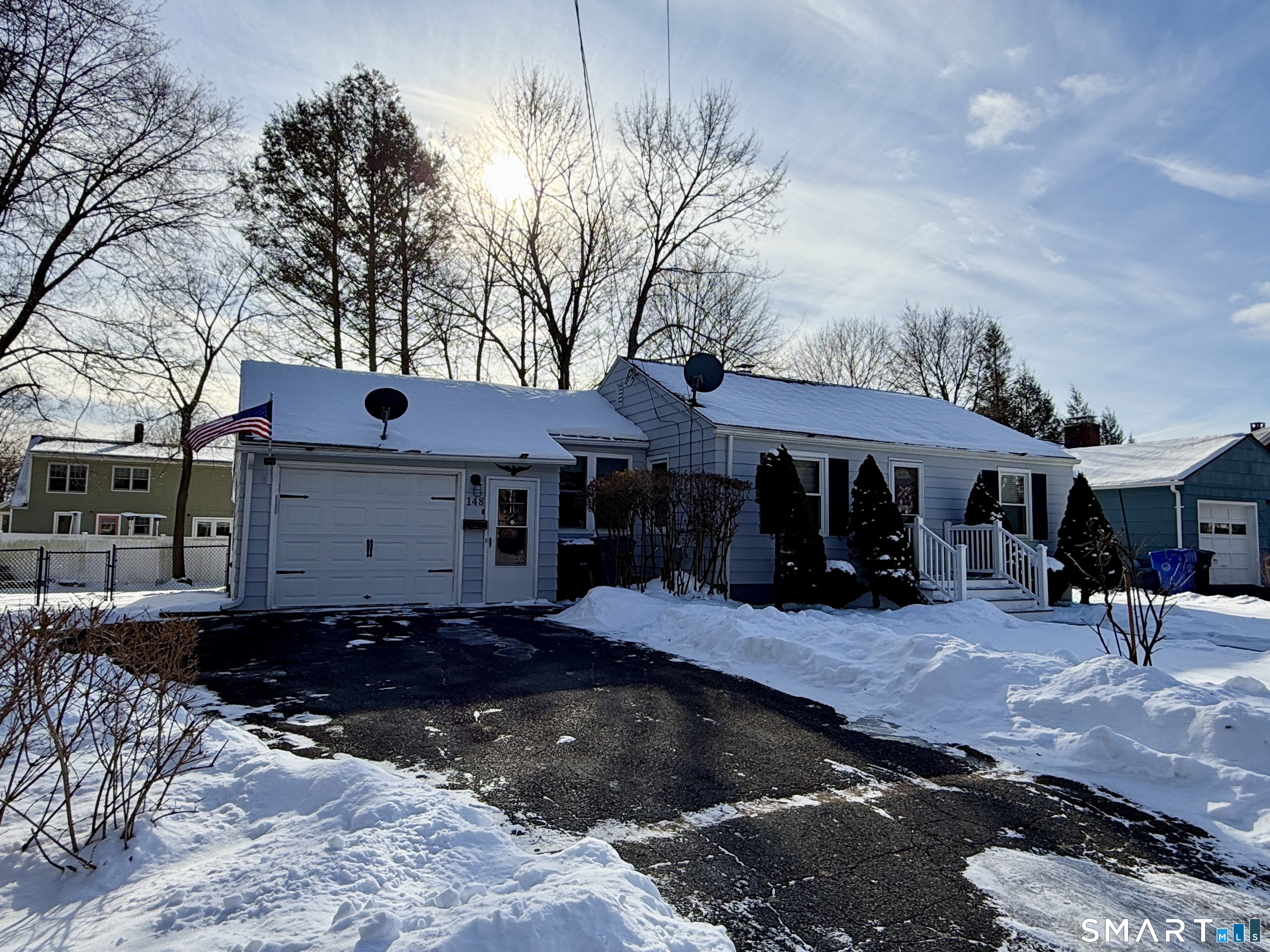 148 Lois Street Torrington, CT 06790 - Photo 2 of 17 a view of a house with a patio