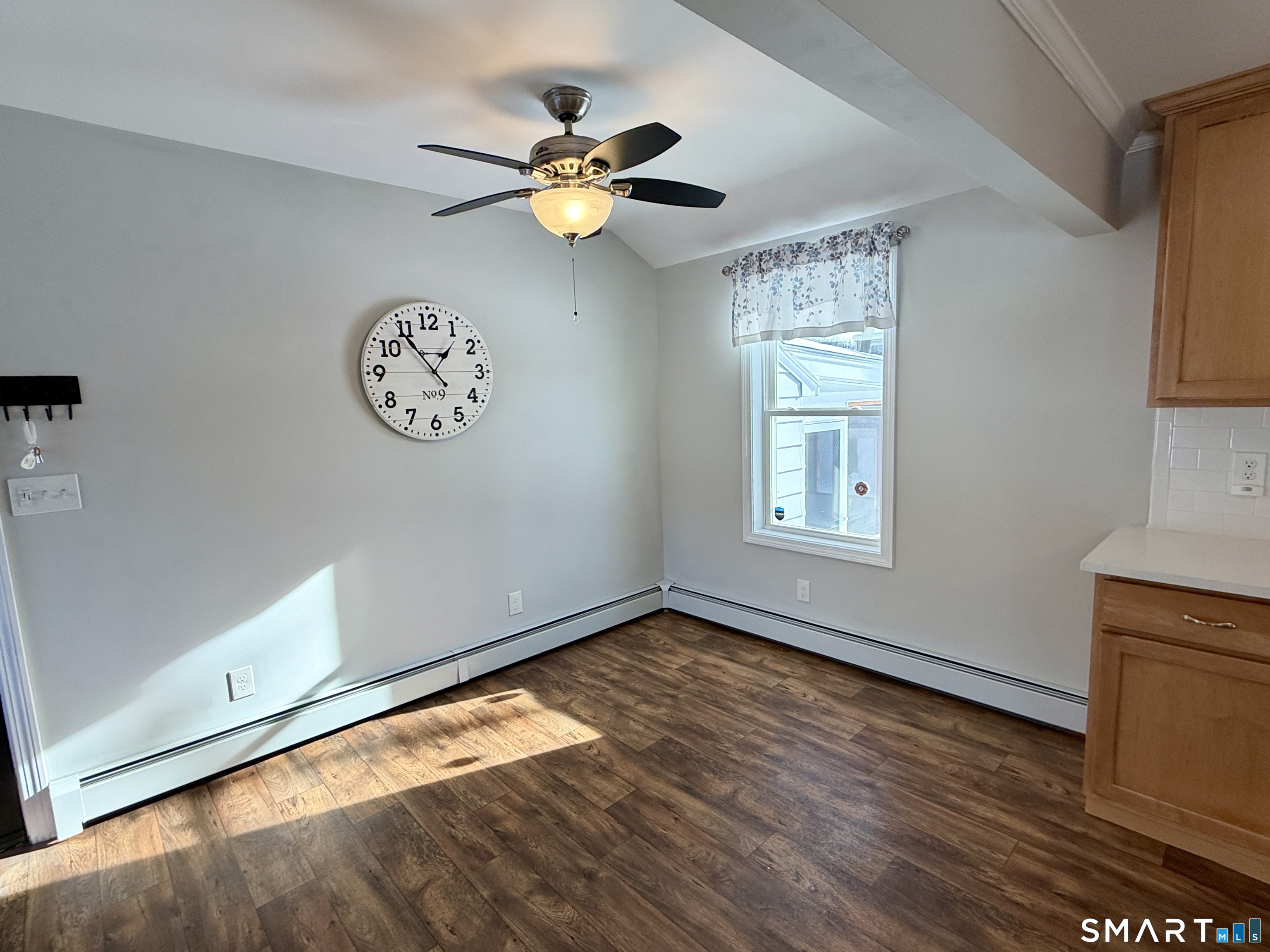 148 Lois Street Torrington, CT 06790 - Photo 6 of 17 a view of a room with wooden floor and window