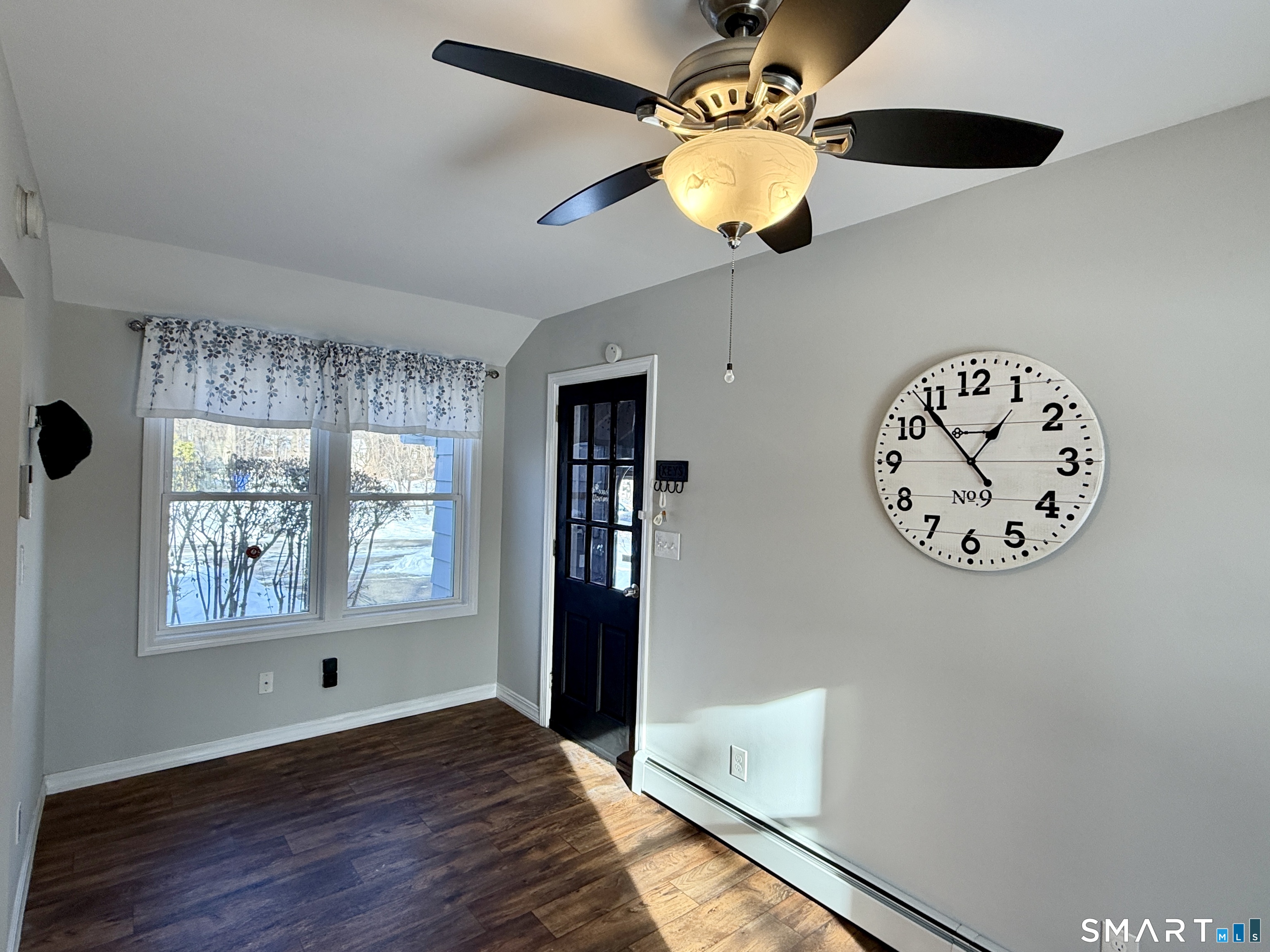 148 Lois Street Torrington, CT 06790 - Photo 7 of 17 a view of an empty room with a window