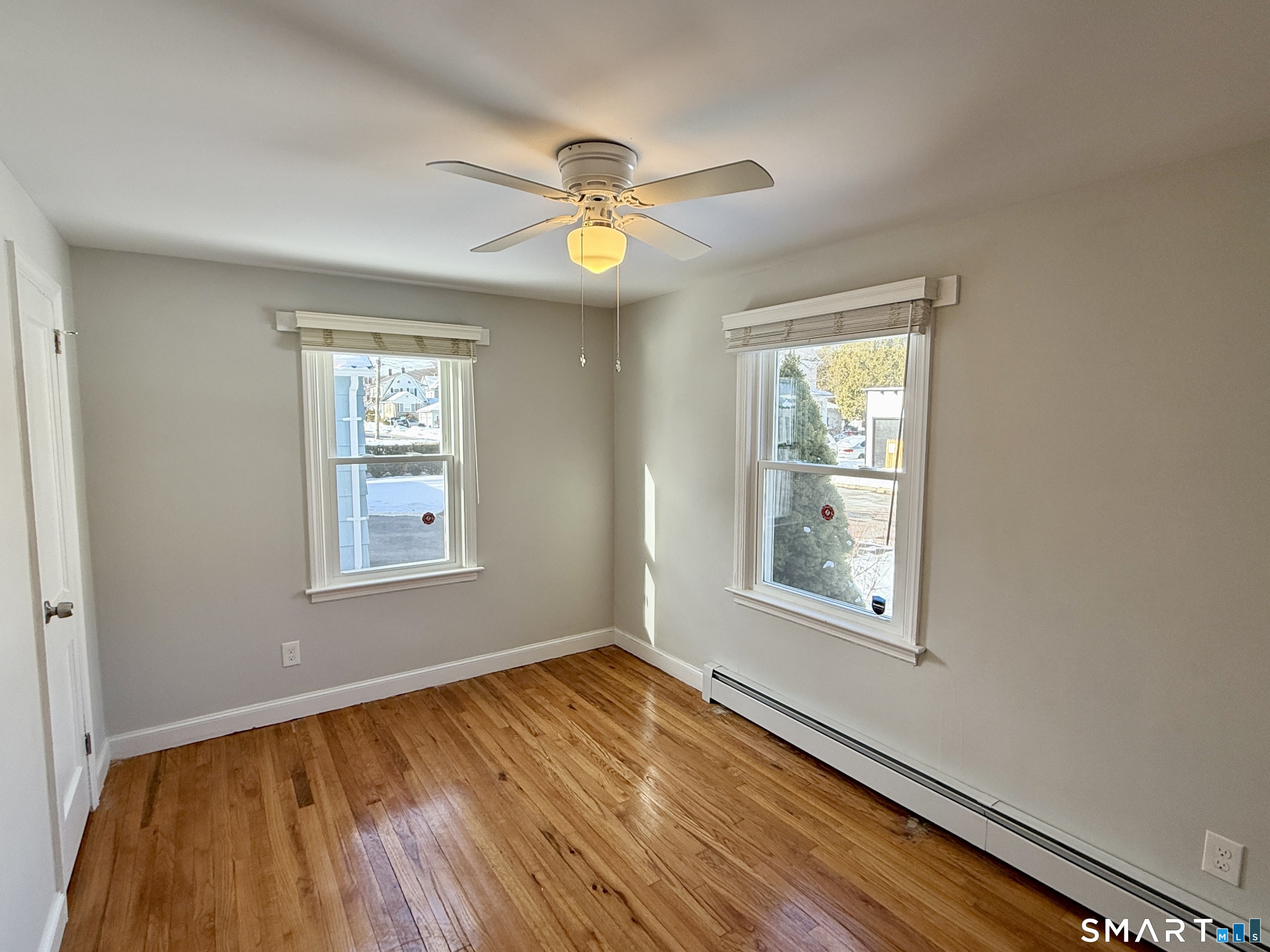148 Lois Street Torrington, CT 06790 - Photo 10 of 17 an empty room with windows and closet