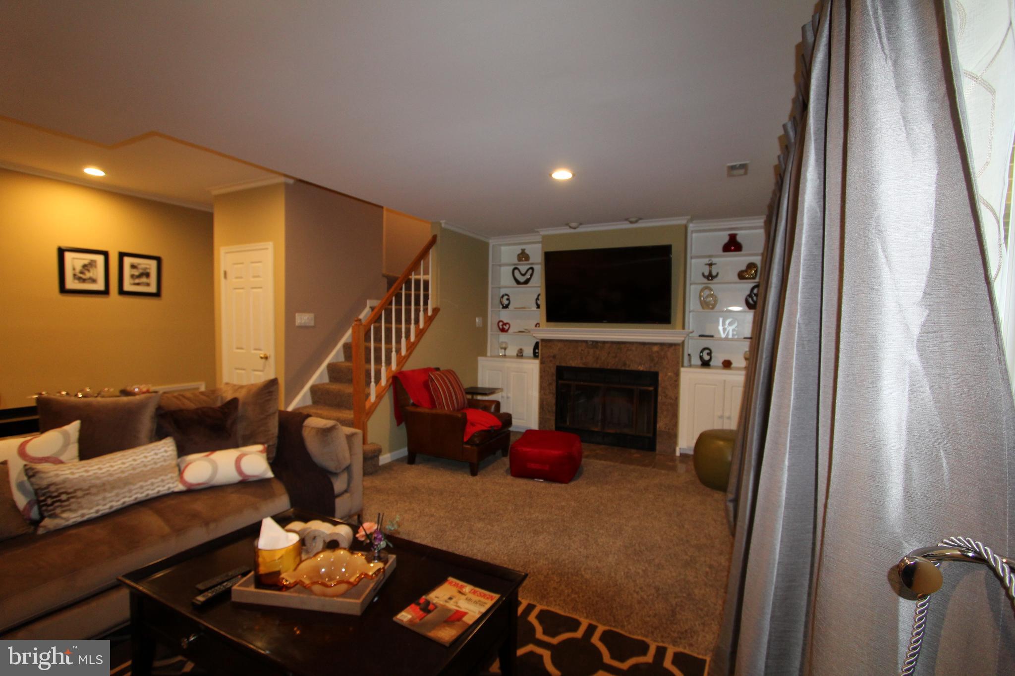 5145 Columbia Road, Unit 831 Columbia, MD 21044 - Photo 7 of 38 Basement with Fireplace