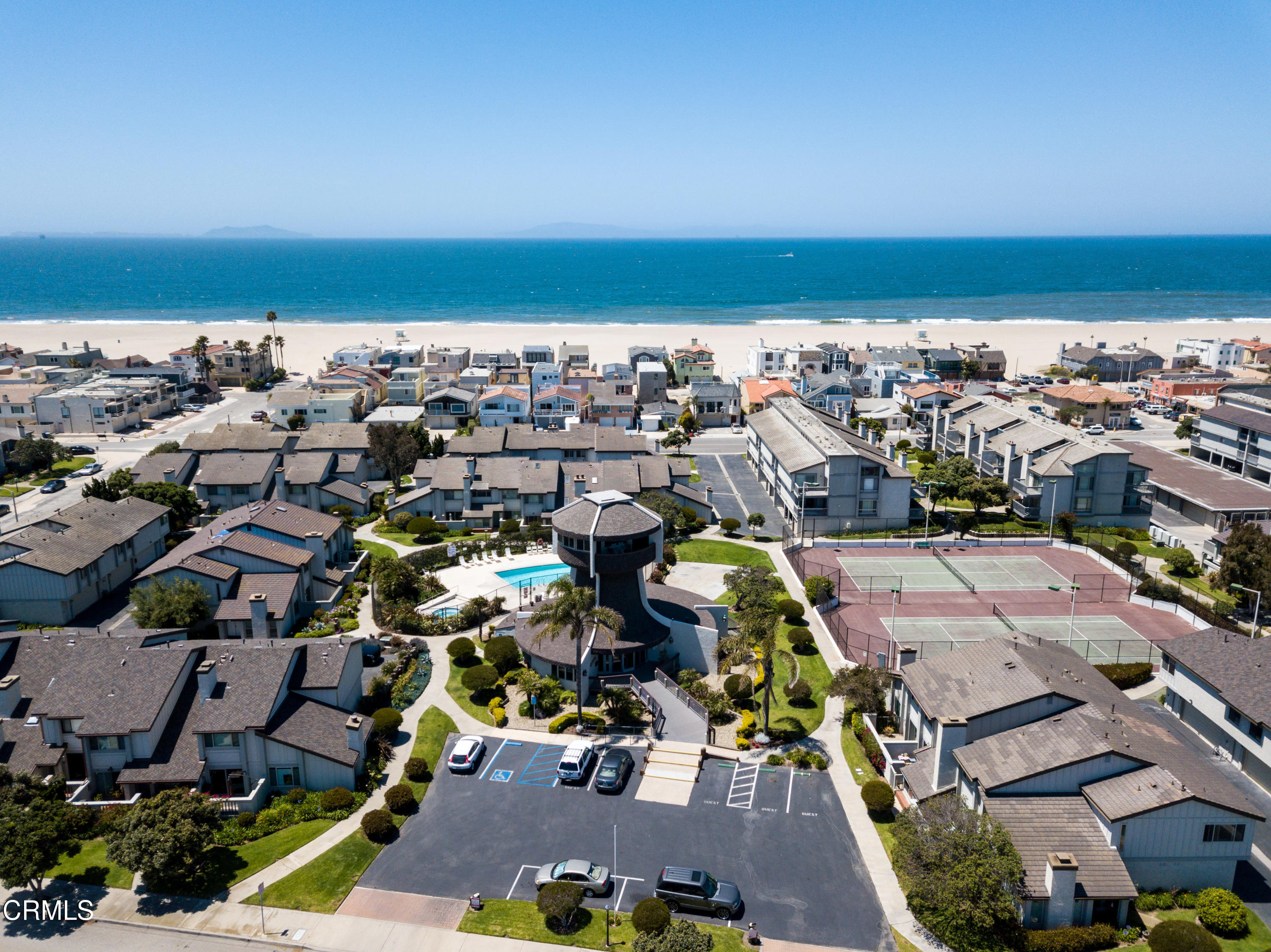 2947 Harbor Boulevard Oxnard, CA 93035 - Photo 3 of 9 an aerial view of a city with lots of residential buildings and ocean view in back