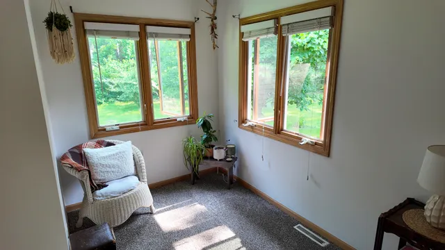 a room with furniture and a window