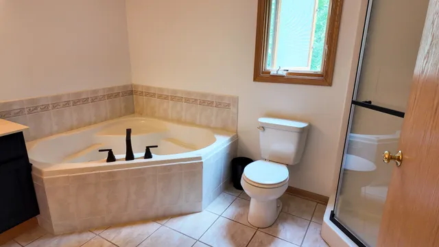 a bathroom with a toilet and a sink