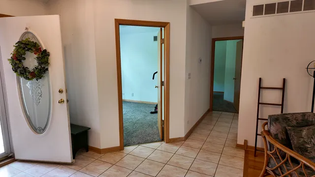 a view of a utility room with an entryway