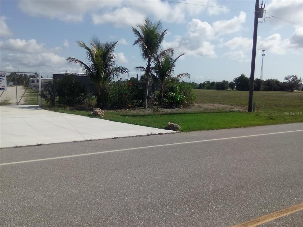102 Harness Road Placida, FL 33946 - Photo 3 of 12 a view of a yard
