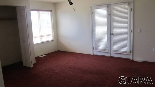 2153 I Road Grand Junction, CO 81505 - Photo 4 of 13 an empty room with windows