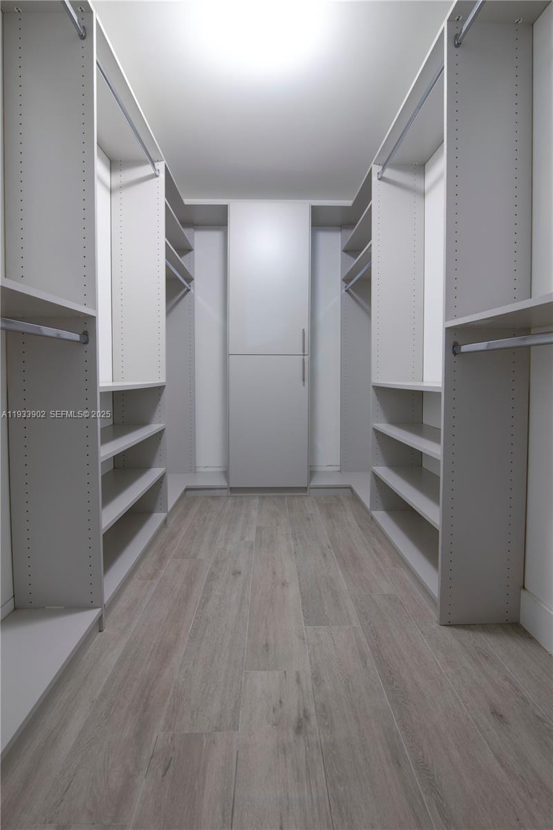488 Northeast 18th Street, Unit 2610 Miami, FL 33132 - Photo 11 of 21 a view of an empty walk in closet