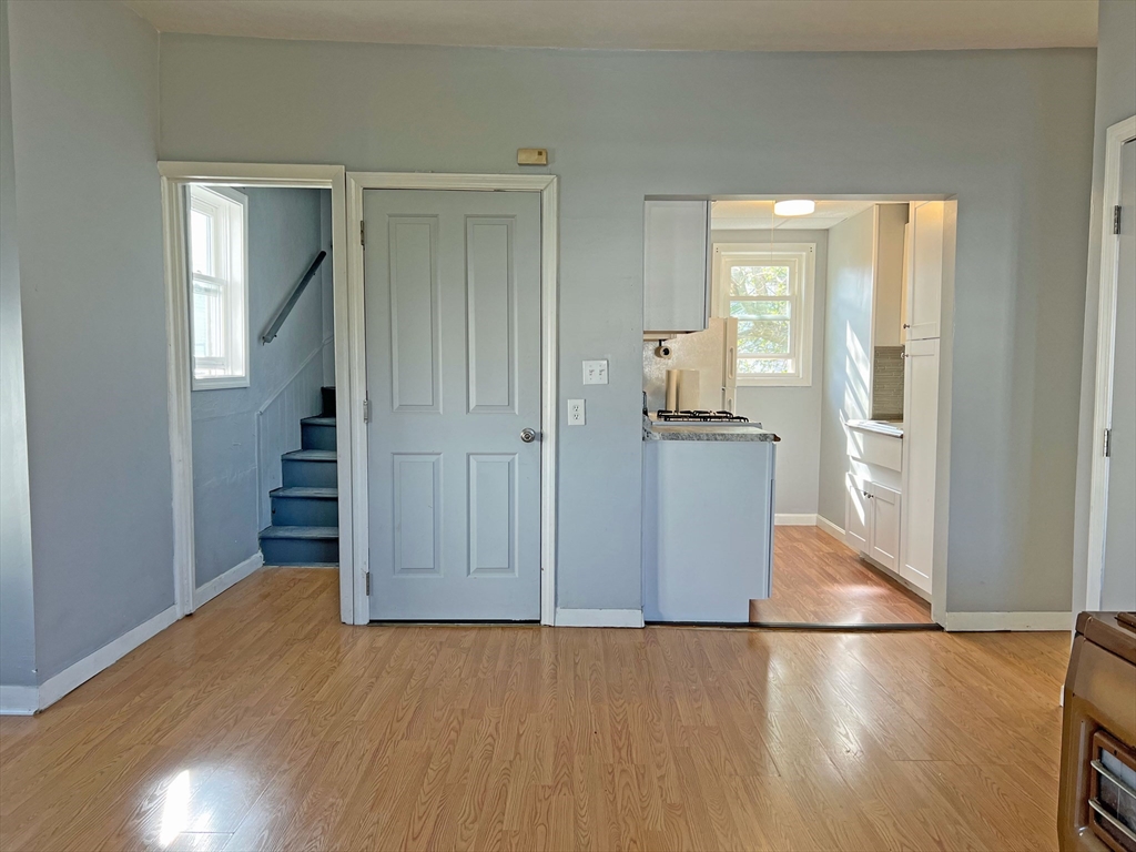 280 Buffinton Street Fall River, MA 02721 - Photo 6 of 21 wooden floor in an empty room