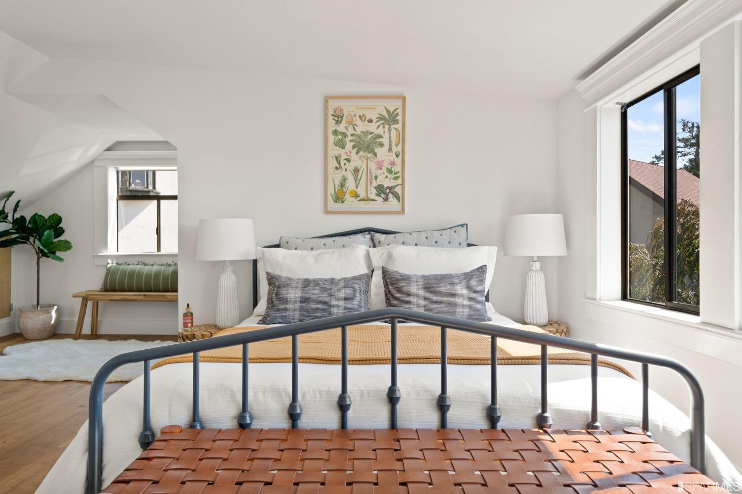 3045 Castro Street San Francisco, CA 94131 - Photo 16 of 44 a bedroom with a bed and wooden floor