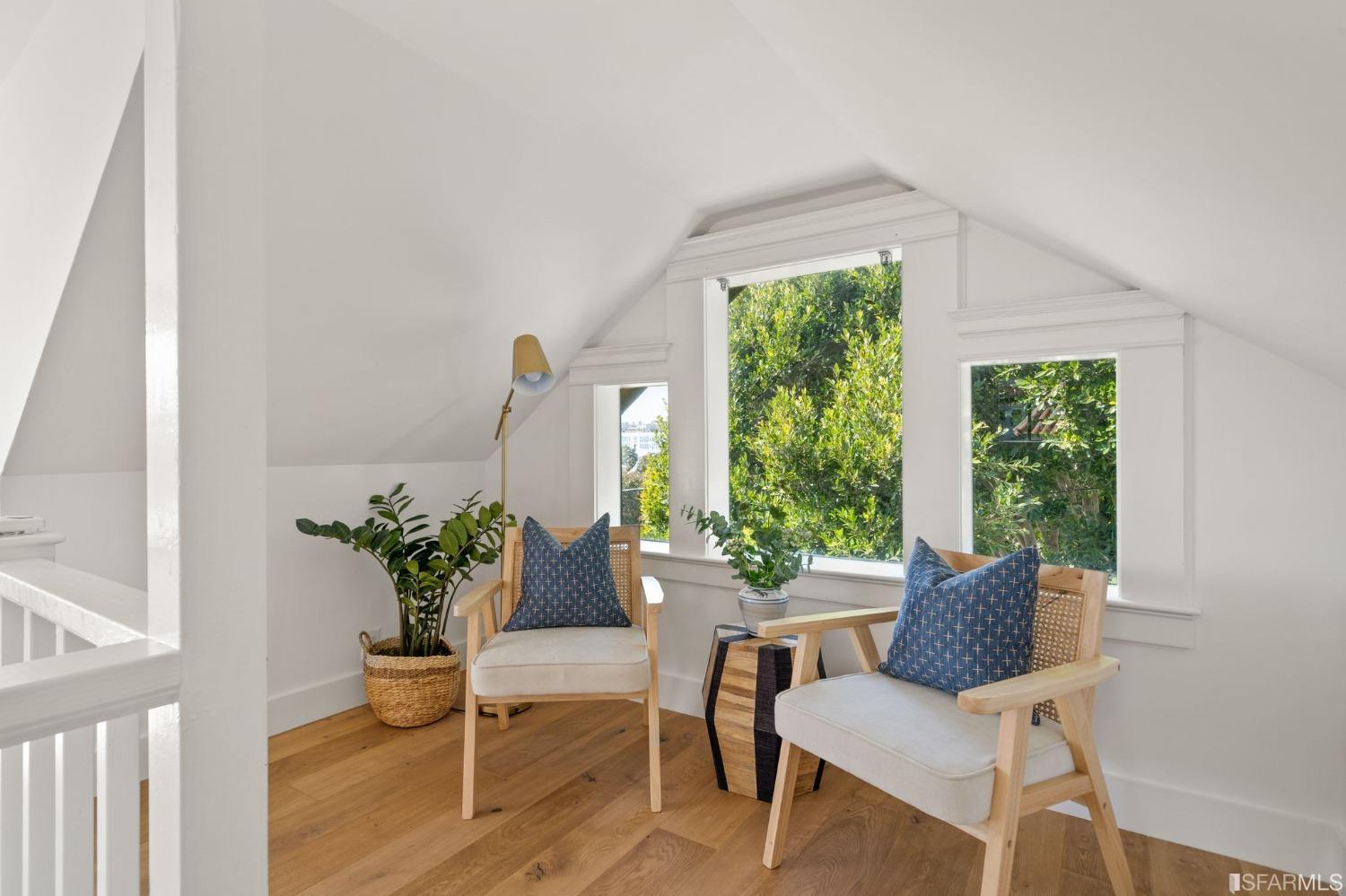 3045 Castro Street San Francisco, CA 94131 - Photo 18 of 44 a living room with furniture and a potted plant