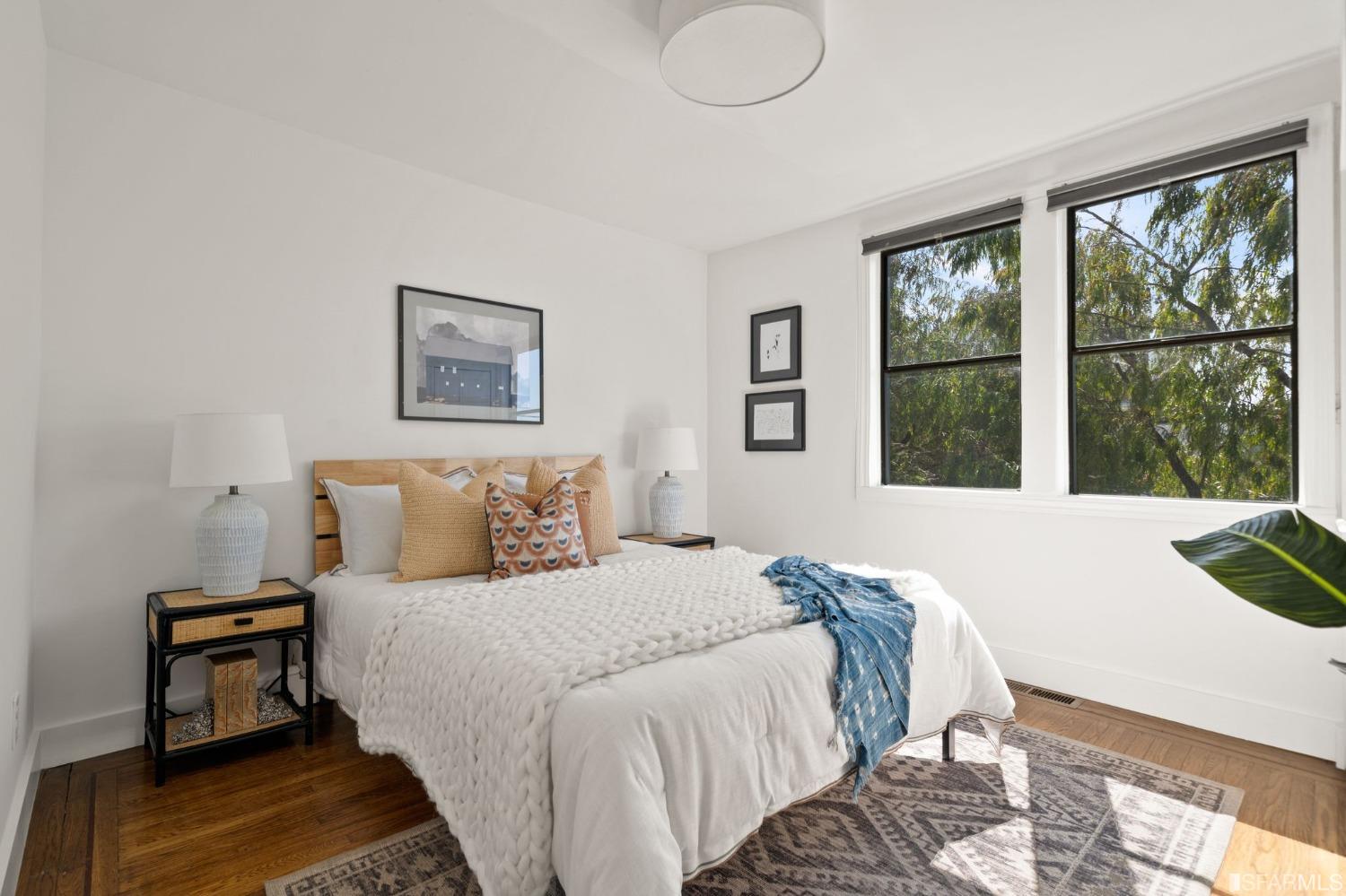 3045 Castro Street San Francisco, CA 94131 - Photo 19 of 44 a bedroom with a bed and a window